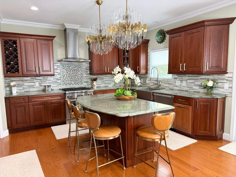 Full kitchen remodel with cherry cabinets, granite island and mosaic backsplash