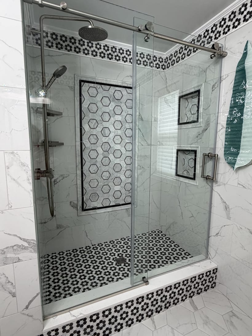 Frameless glass marble tile shower